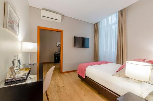 Suite Junior con vistas al interior del hotel TURIM Aveiro Palace. Foto 1