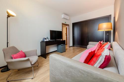 Suite con vistas a la ciudad del hotel TURIM Aveiro Palace. Foto 3