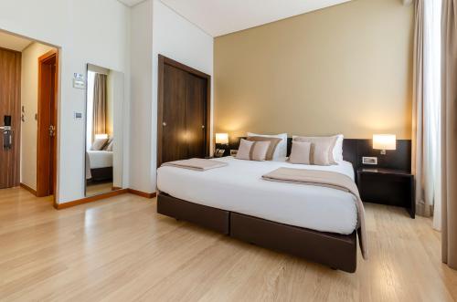Habitación Doble Deluxe con vistas al río - 1 o 2 camas del hotel TURIM Aveiro Palace