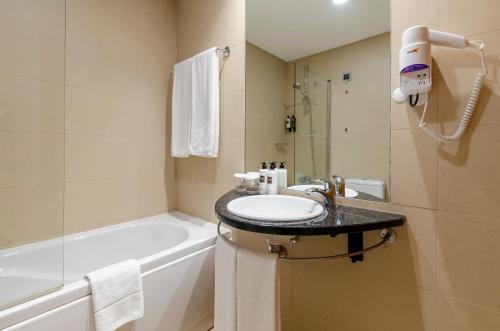Habitación Doble Deluxe con vistas al río - 1 o 2 camas del hotel TURIM Aveiro Palace. Foto 1