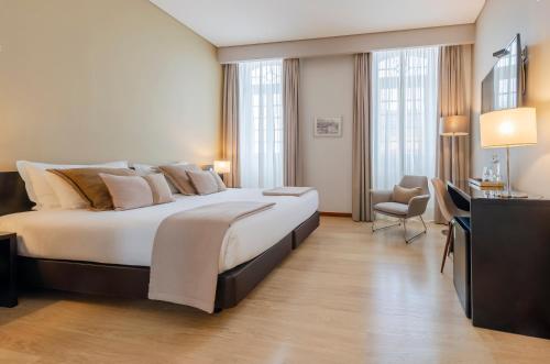 Habitación Doble Deluxe con vistas al río - 1 o 2 camas del hotel TURIM Aveiro Palace. Foto 3