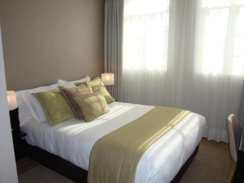 Habitación Doble con vistas a la ciudad del hotel TURIM Aveiro Palace. Foto 3