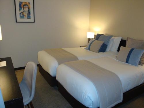 Habitación Doble con vistas al interior - 1 o 2 camas del hotel TURIM Aveiro Palace. Foto 2