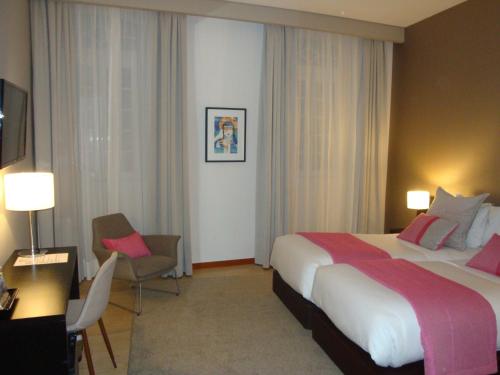 Habitación Doble Deluxe con vistas al río - 1 o 2 camas del hotel TURIM Aveiro Palace. Foto 6