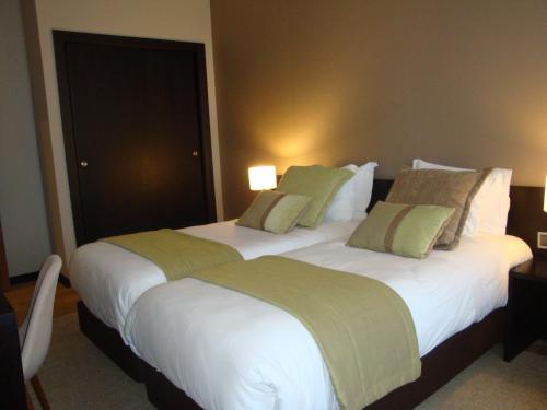 Suite con vistas a la ciudad del hotel TURIM Aveiro Palace. Foto 1