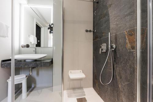 Habitación Doble adaptada para personas con movilidad reducida del hotel MH Florence & Spa”. Foto 4