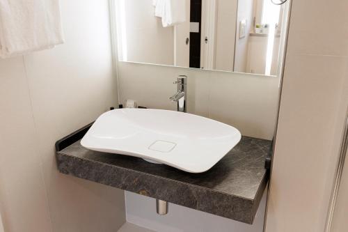Habitación Doble adaptada para personas con movilidad reducida del hotel MH Florence & Spa”. Foto 5