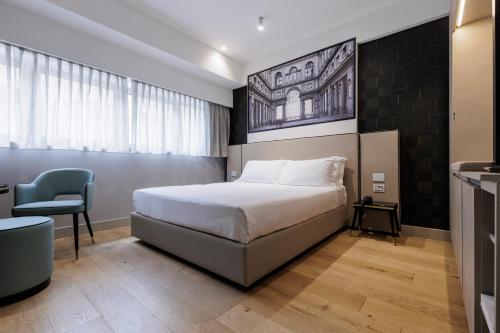 Habitación Doble adaptada para personas con movilidad reducida del hotel MH Florence & Spa”. Foto 9