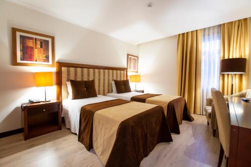 Oferta especial - Habitación Doble - 1 o 2 camas del hotel Veneza. Foto 3