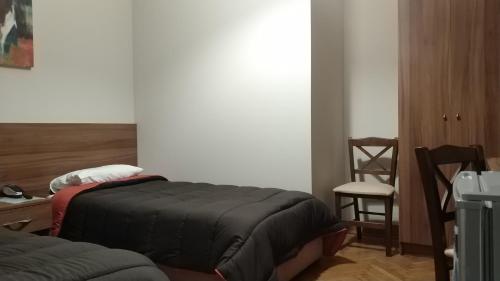 Habitación Doble Económica - 1 o 2 camas del hotel Ambrosia Suites and Aparts. Foto 5