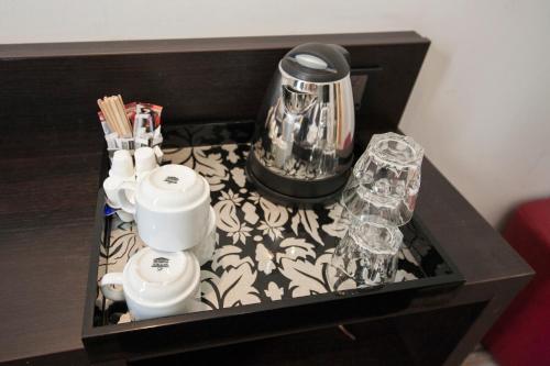 Habitación Triple con baño privado del hotel St George's Inn Victoria