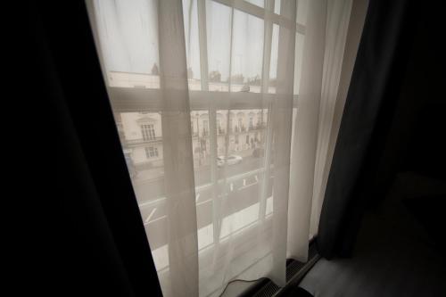 Habitación Cuádruple con baño privado del hotel St George's Inn Victoria. Foto 2