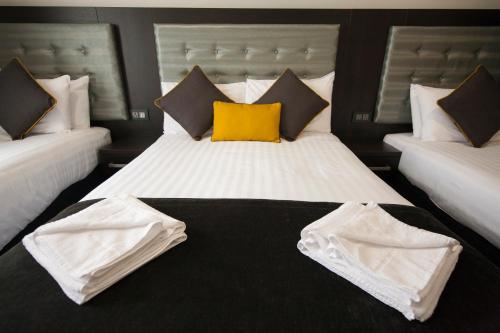 Habitación Cuádruple con baño privado del hotel St George's Inn Victoria. Foto 4