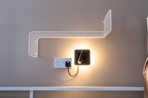 Cama en habitación compartida mixta de 8 camas del hotel Book A Bed. Foto 8