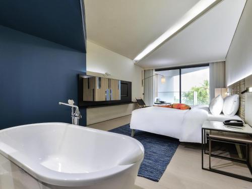 Sea Breeze (Double Queen), 2 Queen Size Beds, Garden View del hotel Veranda Resort Pattaya Mgallery - Sha Extra Plus. Foto 1
