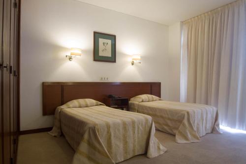 Habitación Doble - 2 camas del hotel Residencial Greco. Foto 1