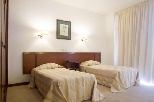 Habitación Doble - 2 camas del hotel Residencial Greco. Foto 2