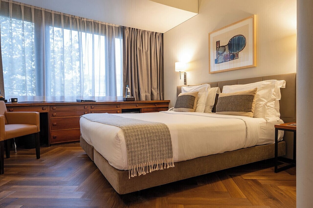 Habitación superior con 1 cama doble o 2 individuales del hotel Dom Carlos Park