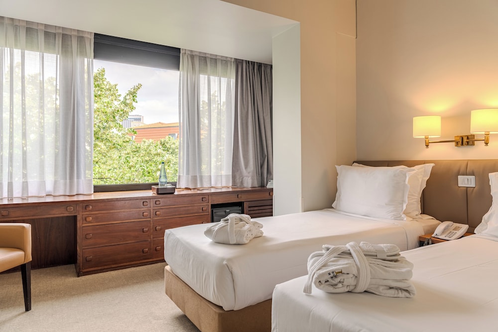 Habitación clásica con 2 camas individuales del hotel Dom Carlos Park. Foto 1