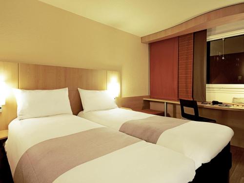 Habitación Doble Estándar - 2 camas del hotel Ibis Braga. Foto 4