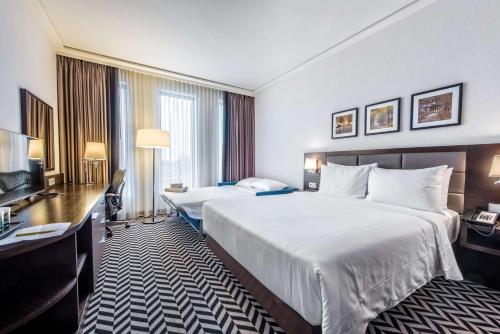 Habitación Familiar - Cama grande del hotel Hilton Garden Inn Krakow Airport