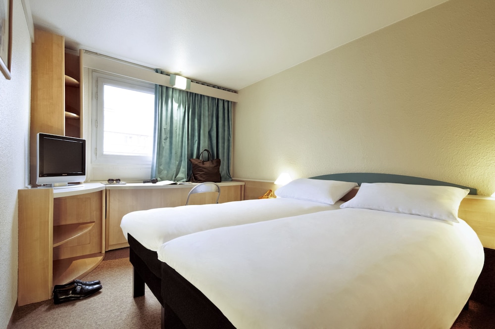Habitación, 2 camas individuales del hotel Ibis Guimaraes. Foto 1