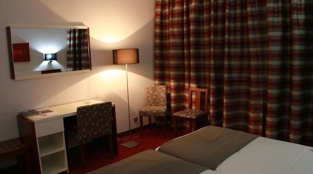 Habitación estándar con 2 camas individuales del hotel Dighton. Foto 6
