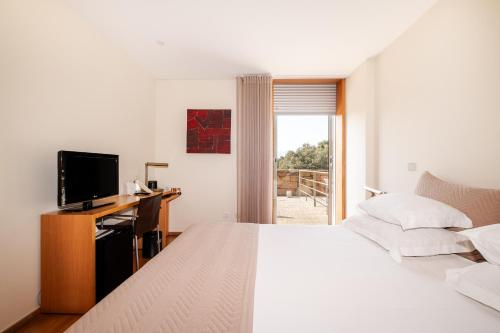 Habitación Doble con vistas al campo de golf - 1 o 2 camas del hotel Axis Ponte De Lima Golf Resort. Foto 2