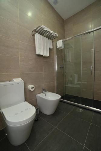 Habitación Doble - 2 camas del hotel Porto Domus. Foto 1