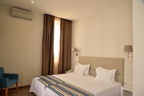 Habitación Doble - 2 camas del hotel Porto Domus. Foto 4