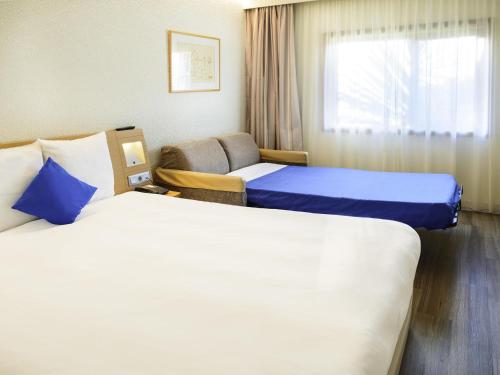 Habitación Doble Estándar - 2 camas del hotel Novotel Porto Gaia. Foto 2