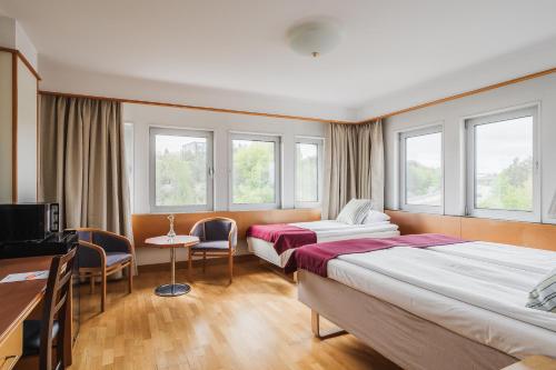 Habitación Triple del hotel 2home Stockholm South. Foto 6