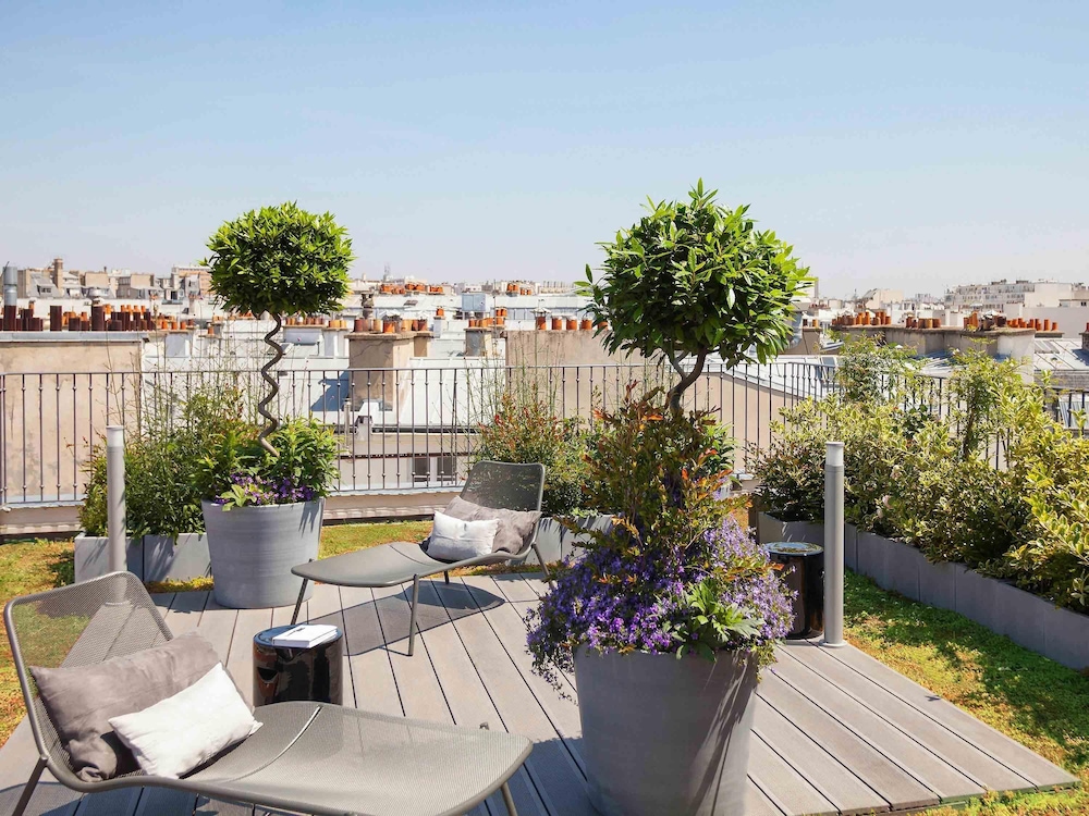 Suite Deluxe, 1 cama de matrimonio grande, terraza del hotel Boutet Bastille Hotel Paris - MGallery Collection. Foto 5