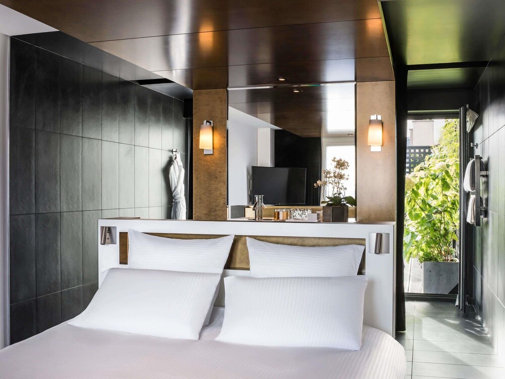 Suite Signature, 1 cama de matrimonio grande (Teck Executive) del hotel Boutet Bastille Hotel Paris - MGallery Collection. Foto 1