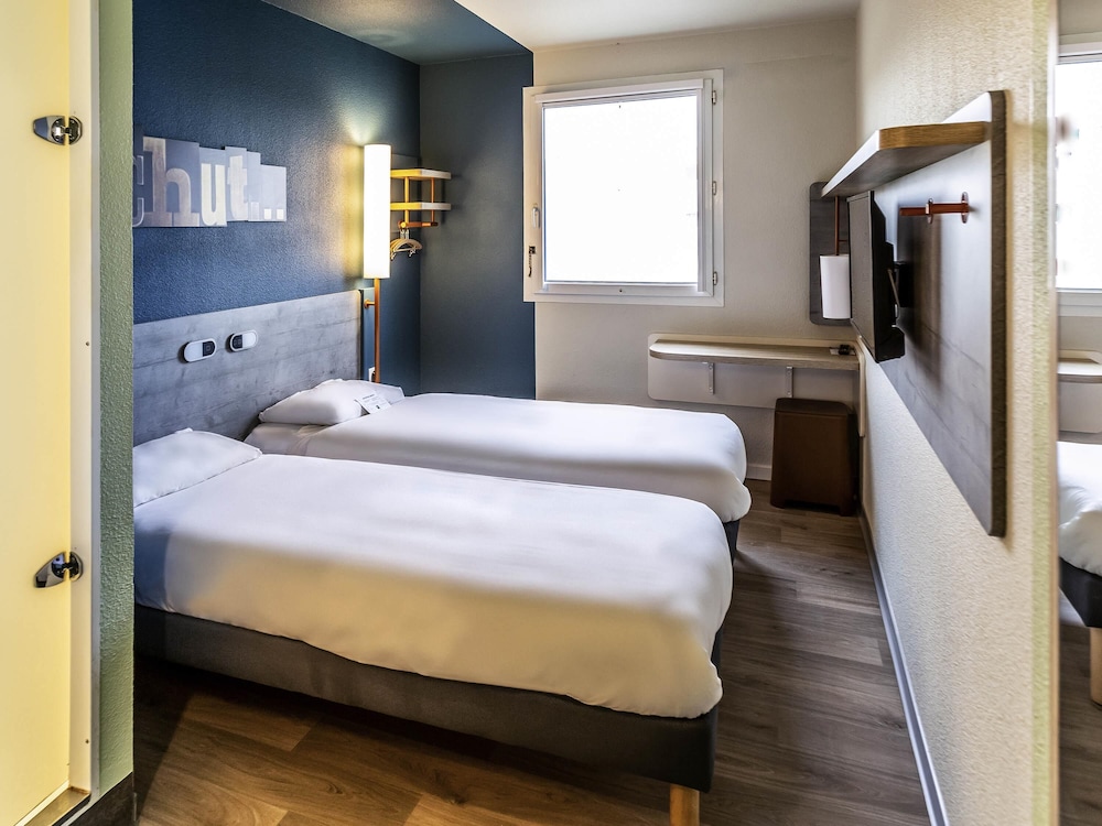 TWIN - Habitación con 2 camas individuales del hotel ibis budget Amboise. Foto 1