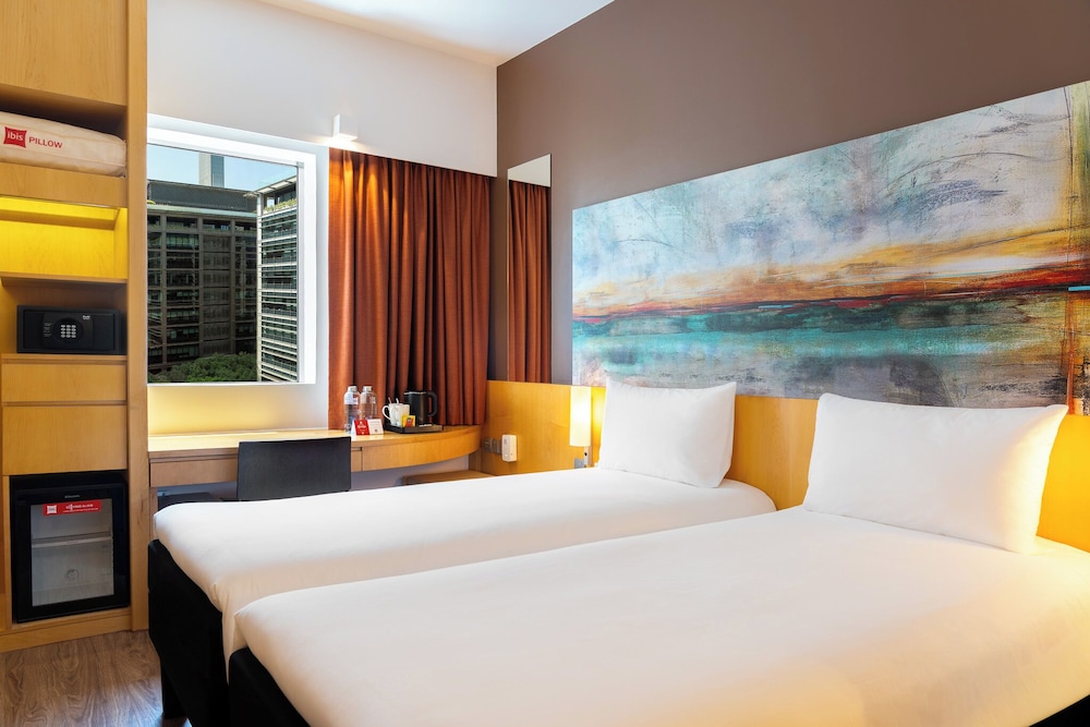 Habitación estándar - Dos camas individuales del hotel Ibis One Central. Foto 5