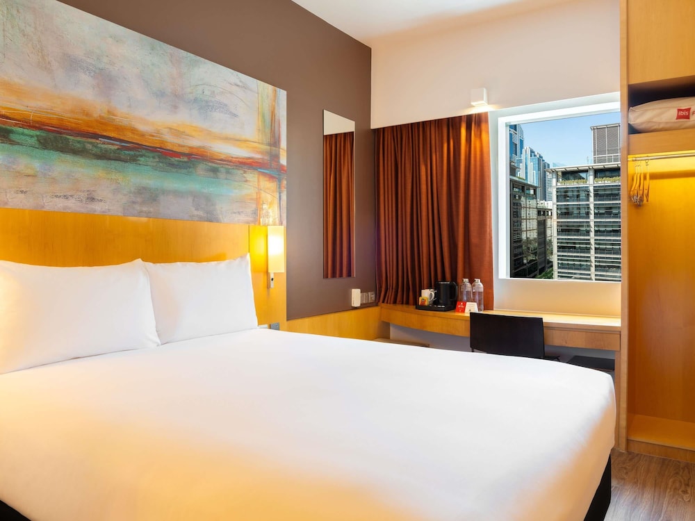 Habitación Premium, Cama Queen Size, Con Beneficios Adicionales del hotel Ibis One Central. Foto 1