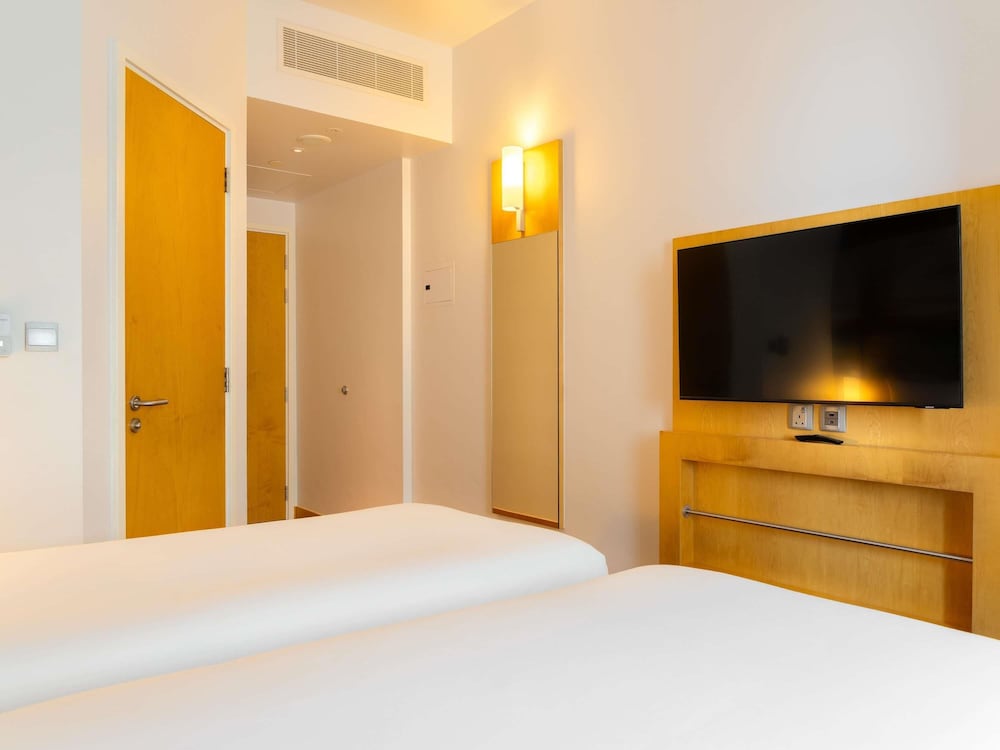 Habitación Premium, Dos Camas Individuales, Con Beneficios Adicionales del hotel Ibis One Central. Foto 8