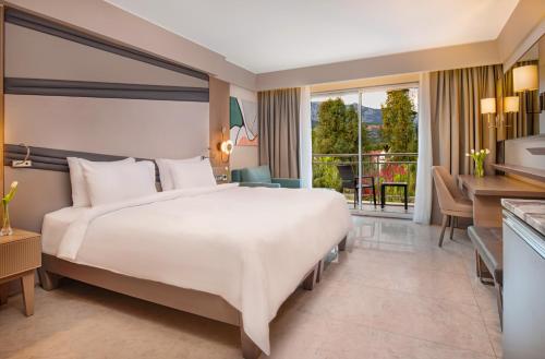 Habitaciones Deluxe del hotel Rixos Premium Tekirova - The Land Of Legends. Foto 4