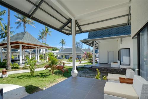 Alojamiento Doble Premier Lumbung del hotel Jambuluwuk Oceano Resort Gili Trawangan. Foto 1