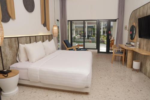Alojamiento Doble Premier Lumbung del hotel Jambuluwuk Oceano Resort Gili Trawangan. Foto 6