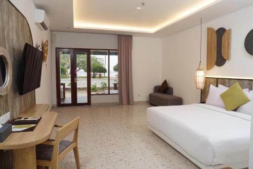 Suite frente a la playa del hotel Jambuluwuk Oceano Resort Gili Trawangan. Foto 4