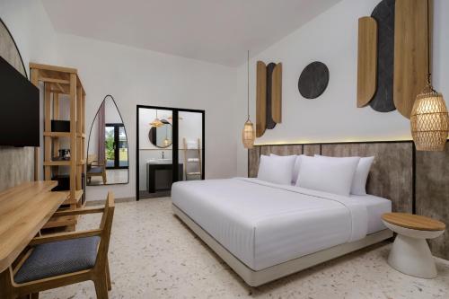 Habitación Doble Deluxe con jardín del hotel Jambuluwuk Oceano Resort Gili Trawangan