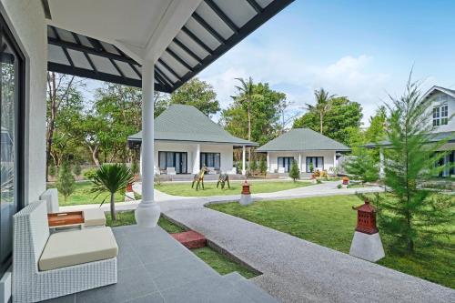 Habitación Cuádruple Deluxe del hotel Jambuluwuk Oceano Resort Gili Trawangan. Foto 1