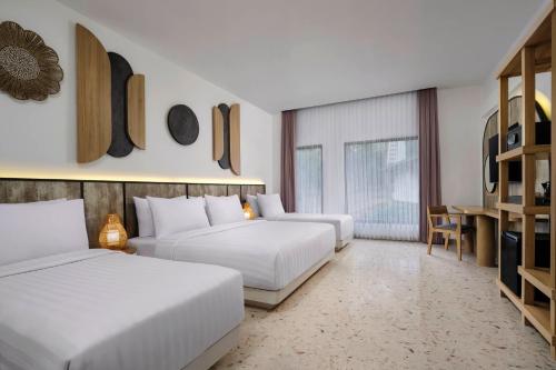 Habitación Cuádruple Deluxe del hotel Jambuluwuk Oceano Resort Gili Trawangan. Foto 3