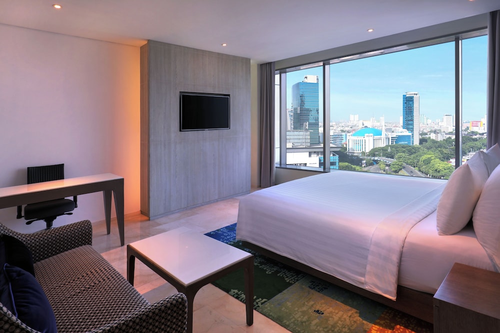 Habitación Ejecutiva con 1 Cama King del hotel Grand Mercure Jakarta Kemayoran. Foto 1