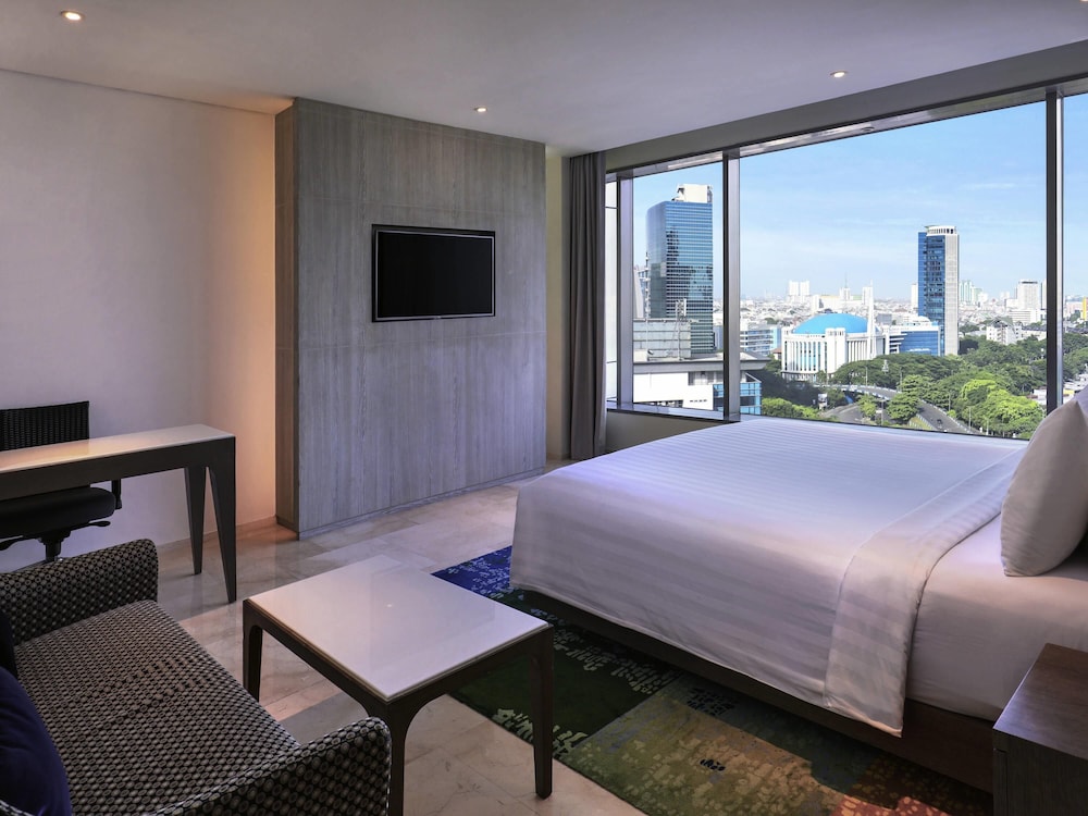 Habitación Ejecutiva con 1 Cama King del hotel Grand Mercure Jakarta Kemayoran. Foto 2