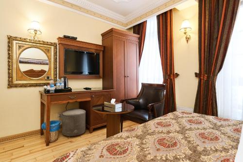Habitación Triple del hotel Best Western Empire Palace and Spa - Special Class. Foto 2