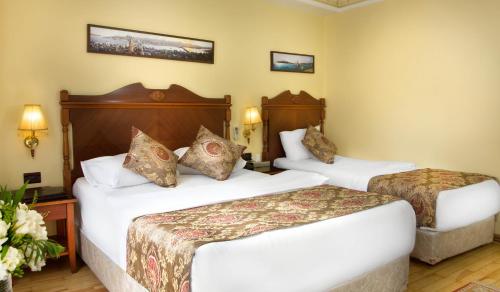 Habitación Triple del hotel Best Western Empire Palace and Spa - Special Class. Foto 4