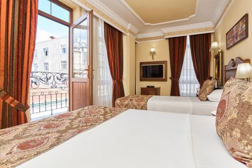 Habitación Triple del hotel Best Western Empire Palace and Spa - Special Class. Foto 11